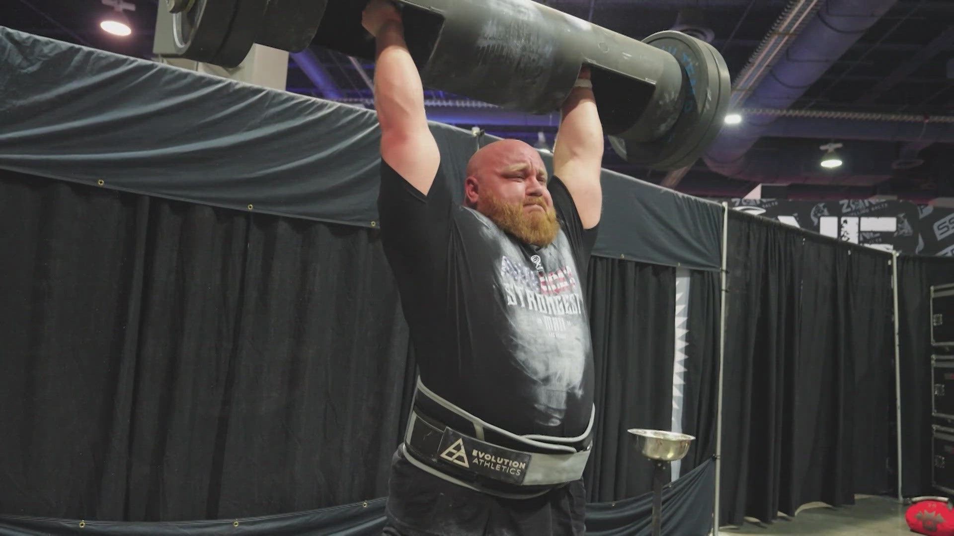 Hatton set a new World's Strongest Man record by pressing 556 pounds overhead.